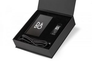 Luxury black gift box filled with branded tech gifts